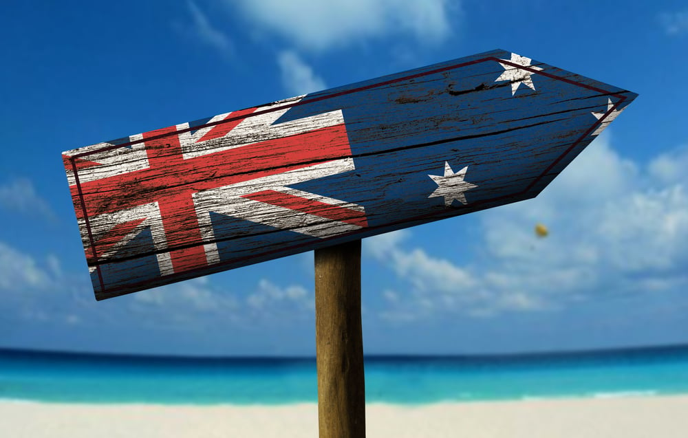 Australia flag wooden sign with a beach on background - Oceania-Apr-26-2024-07-33-17-1092-AM