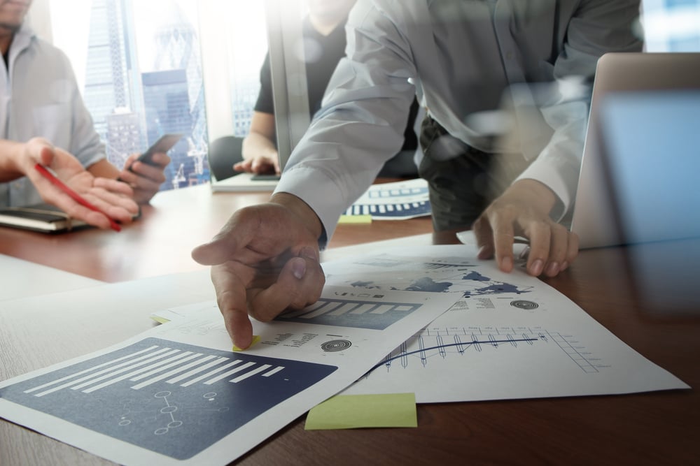 Double exposure of businessman hand working with new modern computer and business strategy as concept-2