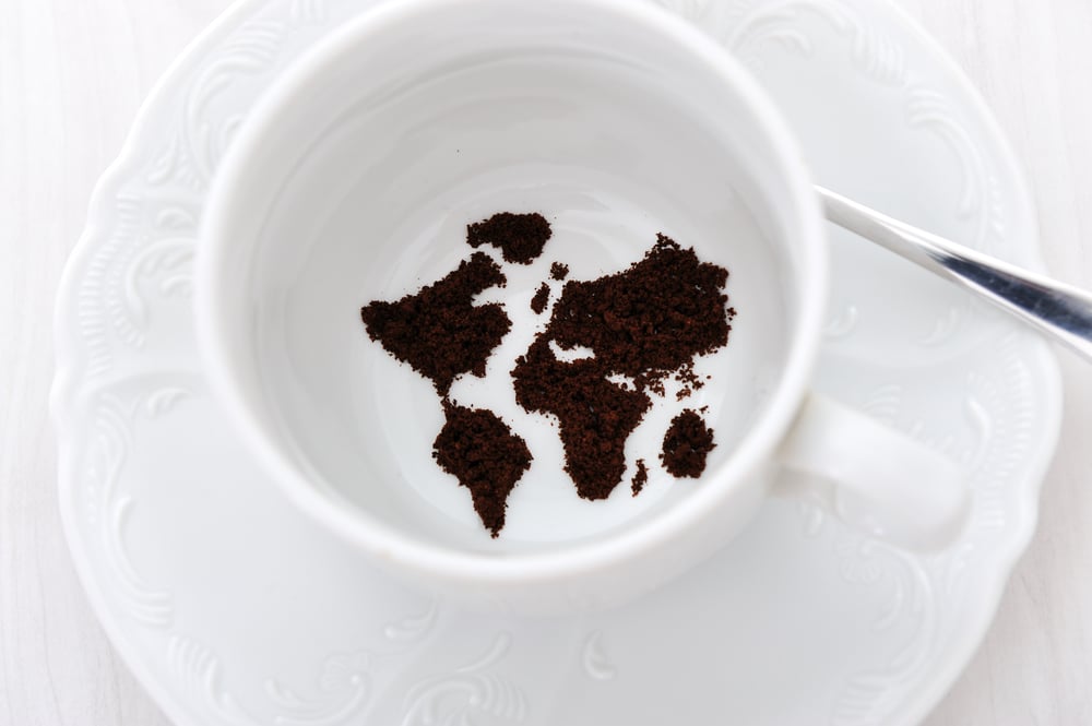 World map in coffee cup-1